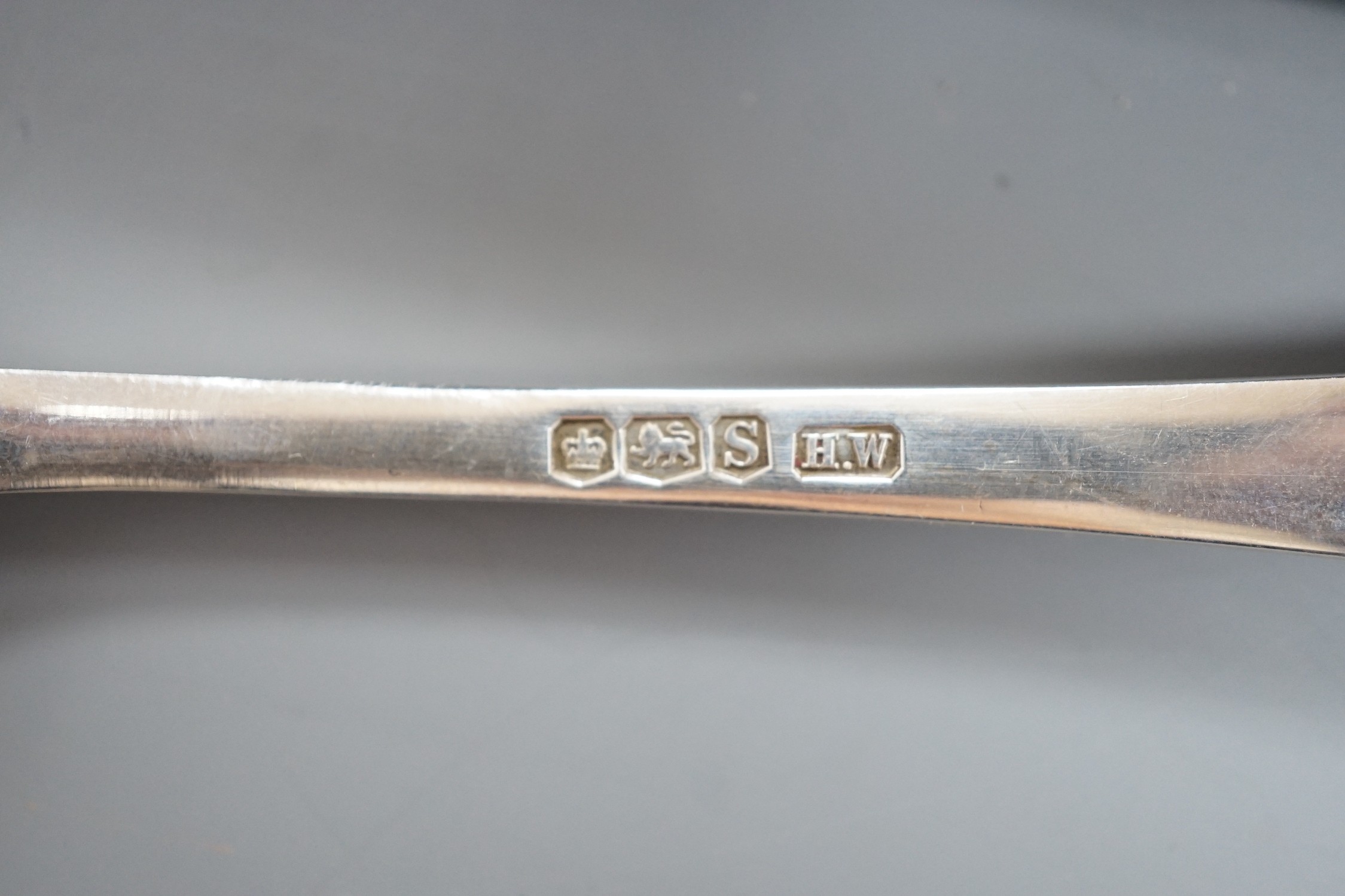 A cased set of six George V silver rat tail pattern soup spoons, Lee & Wigfull, Sheffield, 1935, 10.2oz.